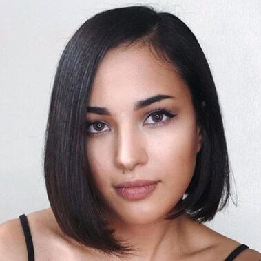 UGC image from Instagram, @avedaartists - brunette bob haircut.